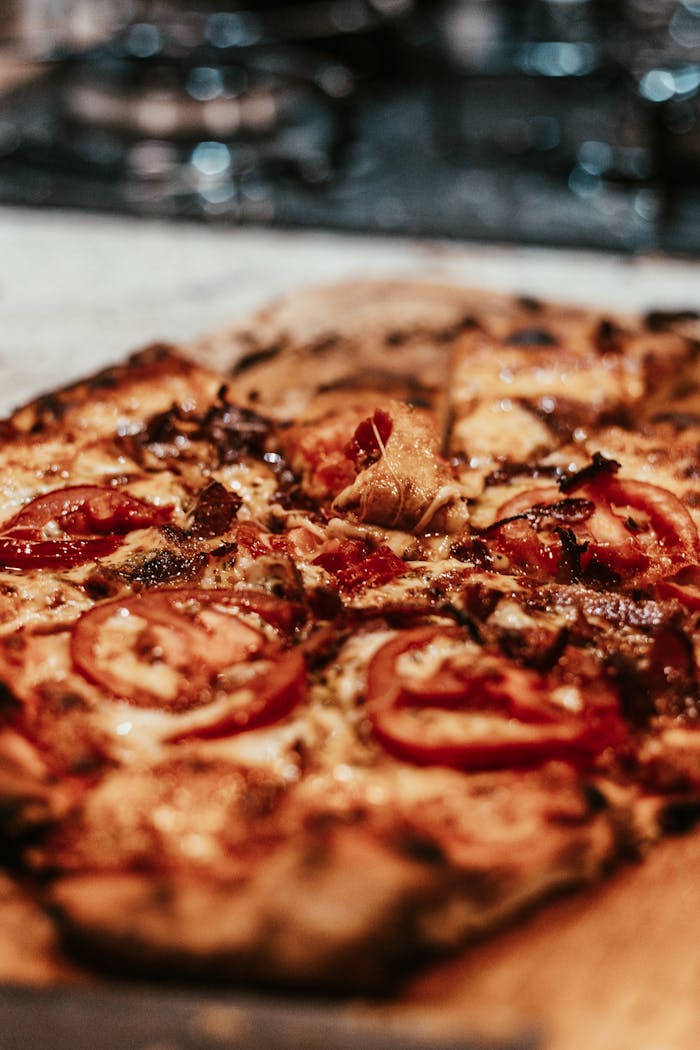 Delicious close-up of a freshly baked, mouthwatering Italian pizza with toppings.